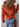 Sweater with large collar in red or orange by the C
