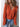 Sweater with large collar in red or orange by the C