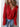 Sweater with large collar in red or orange by the C